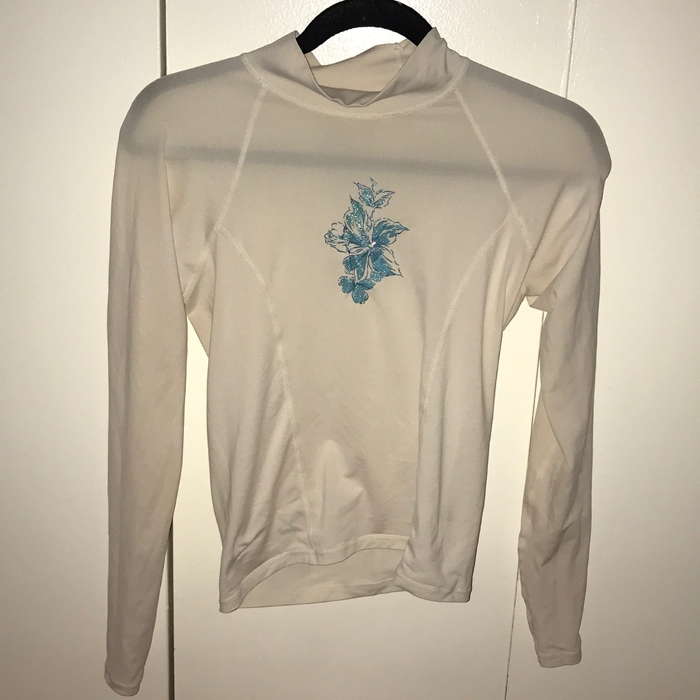 white long sleeved sun cover up with blue decal